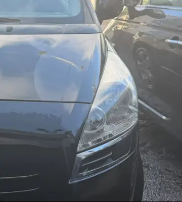 After: the same Peugeot's headlamp polished clear again